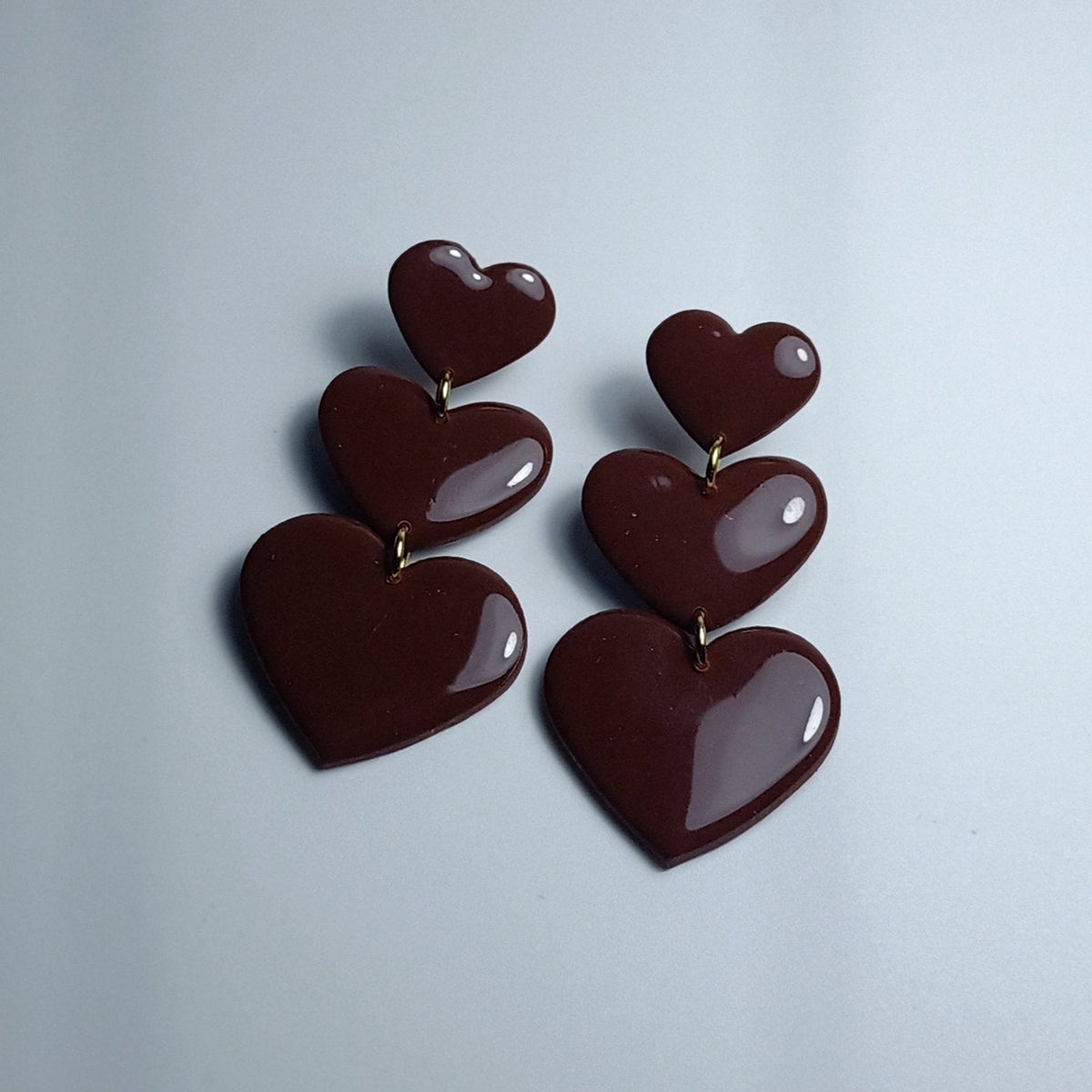 Oorbellen Triple hearts